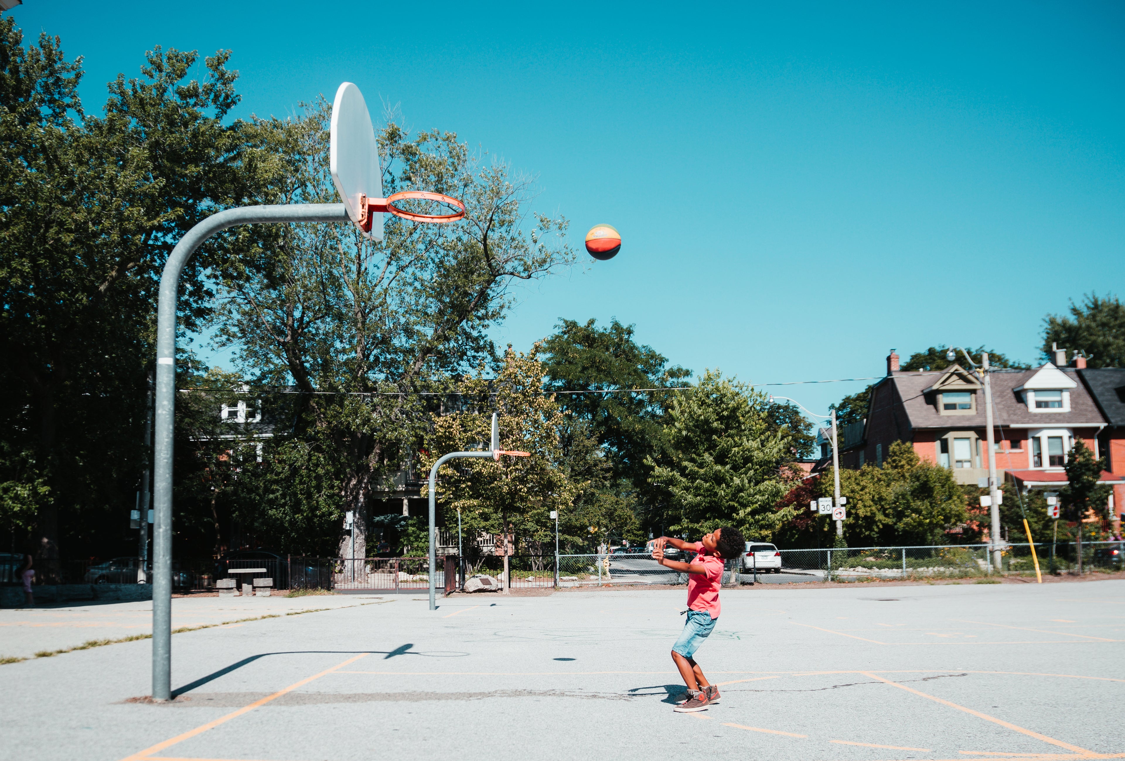 boy-throws-basketball